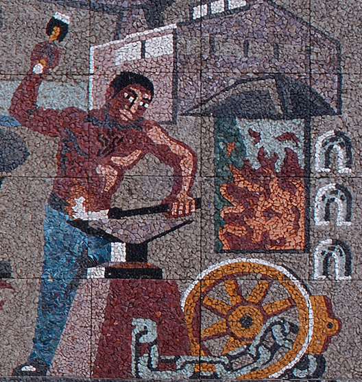 El obrero transformado el metal con ayuda del fuego.png